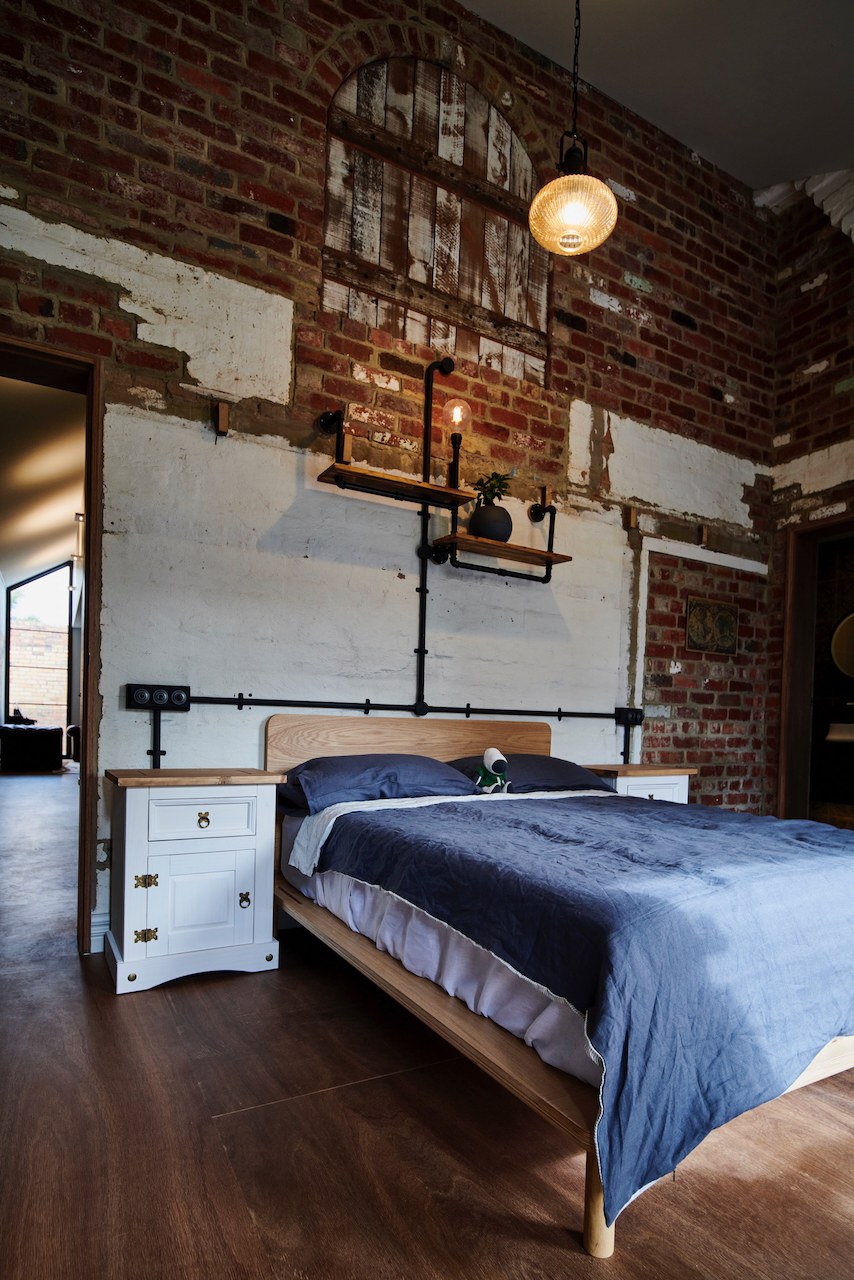Lanes End heritage bedroom with exposed brick