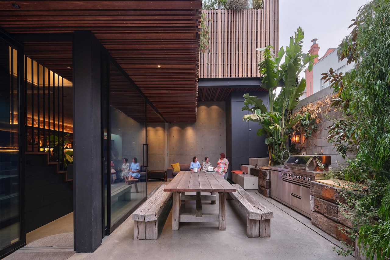Lanes End dining table with courtyard outlook